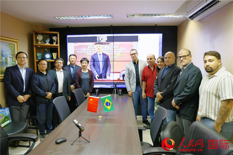 參與備忘錄簽署儀式的嘉賓合影。人民網(wǎng)記者 陳海琪攝