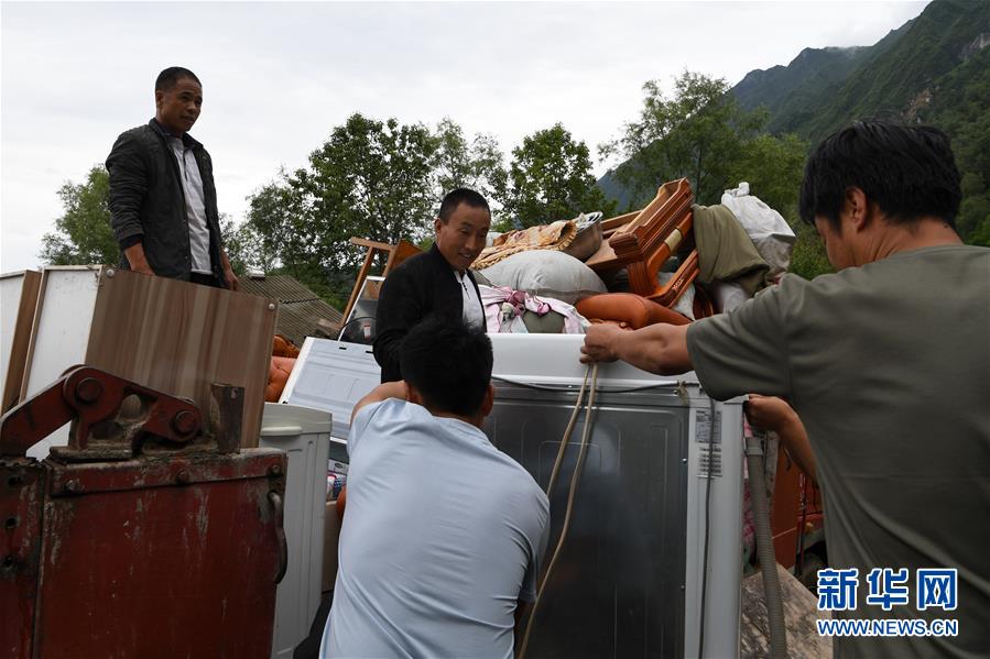 （新華全媒+）（9）千里“挪窩”，踏實開啟新生活